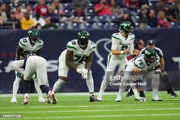Laurent Duvernay-Tardif of the New York Jets gets set with offensive tackle Morgan Moses against the Houston Texans during an NFL game at NRG Stadium...