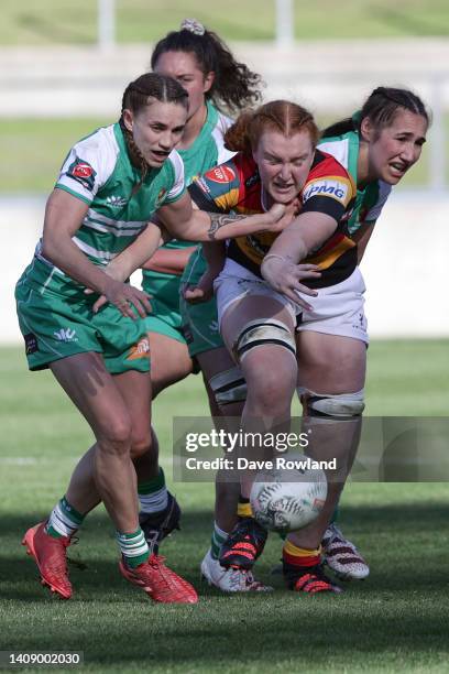 Selica Winiata of Manawatu Cyclones and Leomie Kloppers of Waikato Women challenge for the ball during the round one Farah Palmer Cup match between...