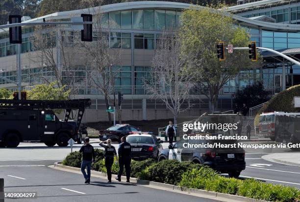 Police and emergency personnel surround the YouTube headquarters after a woman allegedly opened fire on several employees, including her boyfriend,...