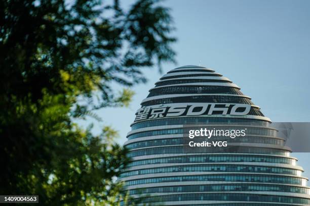 Signage hangs from a building at the Wangjing Soho project on July 14, 2022 in Beijing, China.