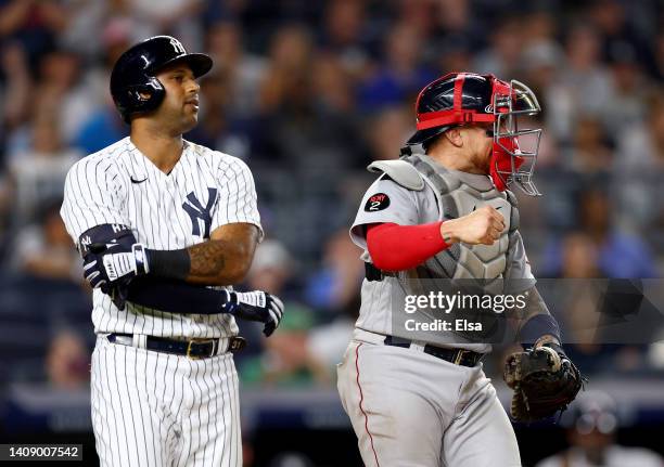 Christian Vazquez of the Boston Red Sox celebrates the win after he tagged out Aaron Hicks of the New York Yankees to end the game at Yankee Stadium...