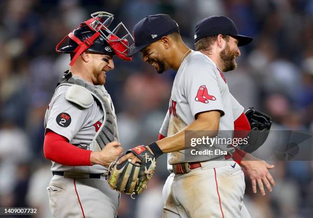 Christian Vazquez, Xander Bogaerts and Ryan Brasier of the Boston Red Sox celebrate the win over the New York Yankees at Yankee Stadium on July 15,...