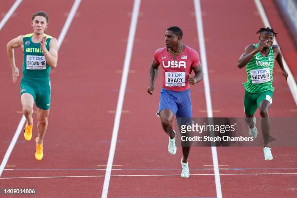 Rohan Browning of Team Australia, Marvin Bracy of Team United States and Raymond Ekevwo of Team Nigeria compete in the Men’s 100 Meter heats on day...