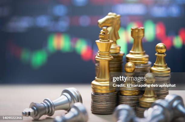 money with chess,gold unicorn chess and business chart ,business concept - riding unicorn stock pictures, royalty-free photos & images