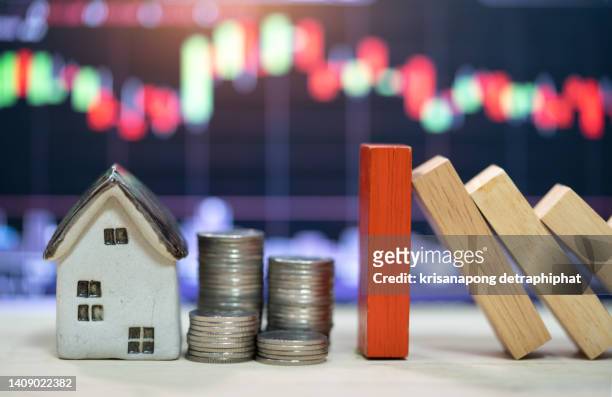 home concept,home insurance concept,domino,wooden block,business risk, strategy and planing concept idea.,house with coins - challenge coin stock pictures, royalty-free photos & images