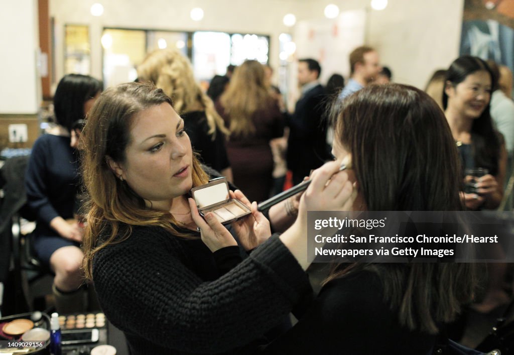 Chantelle Hartshorne with StyleBee shows a guest some makeup samples during a Three Day Rule matchmaking event at LV Mar Restaurant in Redwood City, Calif., on Wednesday, February 8, 2017. The matchmaking service Three Day Rule launched a chapter in Silic