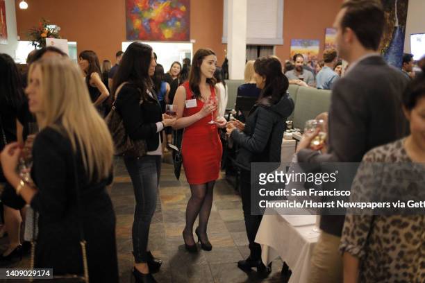 Matchmaker Danika Zias, center, chats with guests during a Three Day Rule matchmaking event at LV Mar Restaurant in Redwood City, Calif., on...