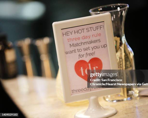 Some event signage on the bar during a Three Day Rule matchmaking event at LV Mar Restaurant in Redwood City, Calif., on Wednesday, February 8, 2017....