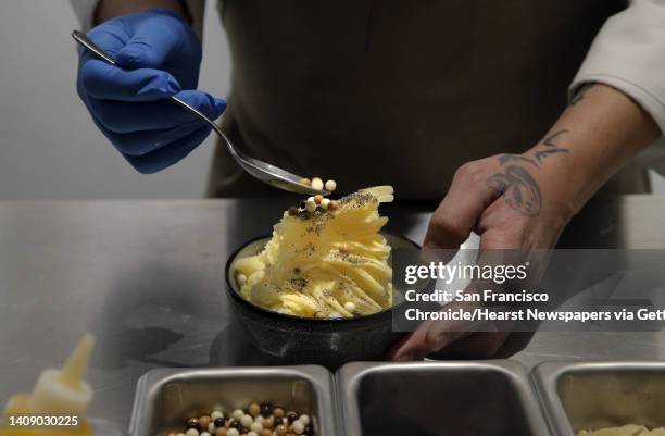 Pastry Chef Luis Villavazquez prepares a Sesame Soft Srve, Mango Shaved Ice dessert at the new China Live Marketplace, the huge $20 million Chinese...