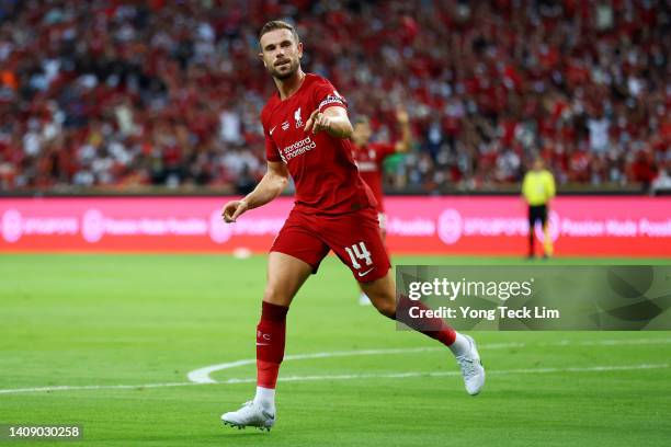 Jordan Henderson of Liverpool celebrates after scoring his team's first goal against Crystal Palace during the first half of their preseason friendly...