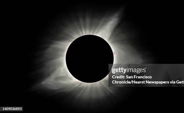 The sun's corona is visible as the moon obscures the sun during the Great American Solar Eclipse at Madras High School in Madras, Oregon, on Monday,...