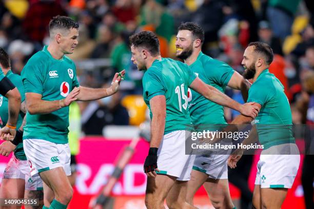 To R, Johnny Sexton, Hugo Keenan, Robbie Henshaw and Jamison Gibson Park of Ireland celebrate Henshaw's try during the International Test match...