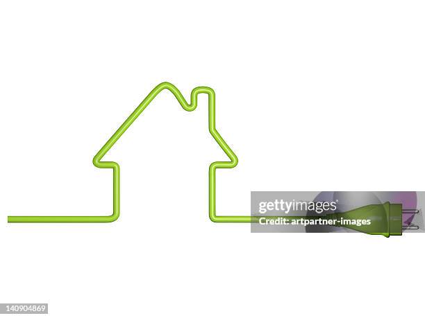 green energy, house with cable and plug - electrical plug foto e immagini stock