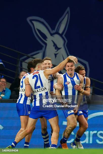 Cameron Zurhaar of the Kangaroos celebrates kicking a goal during the round 18 AFL match between the North Melbourne Kangaroos and the Richmond...