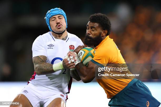Marika Koroibete of the Wallabies is tackled by Jack Nowell of England during game three of the International Test match series between the Australia...