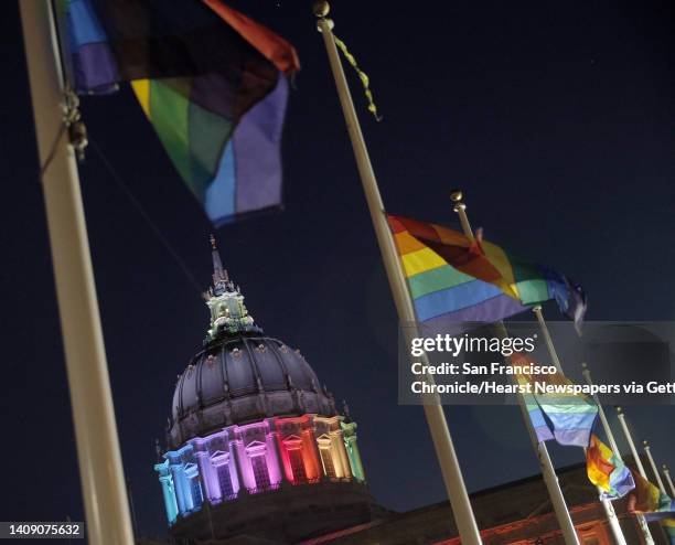 The dome of the Rotunda at City Hall was awash in the colors of the Rainbow Flag for Pride Week in San Francisco, Calif., on Wednesday, June 22, 2016.