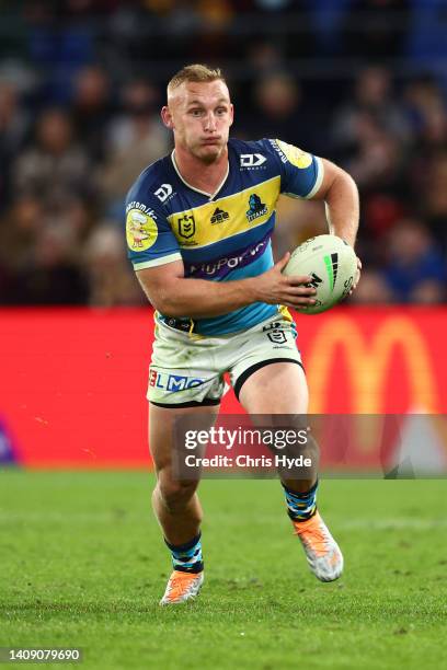 Tanah Boyd of the Titans runs the ball during the round 18 NRL match between the Gold Coast Titans and the Brisbane Broncos at Cbus Super Stadium, on...