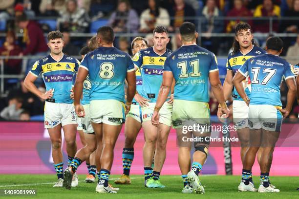 Titans look on after a Broncos try during the round 18 NRL match between the Gold Coast Titans and the Brisbane Broncos at Cbus Super Stadium, on...