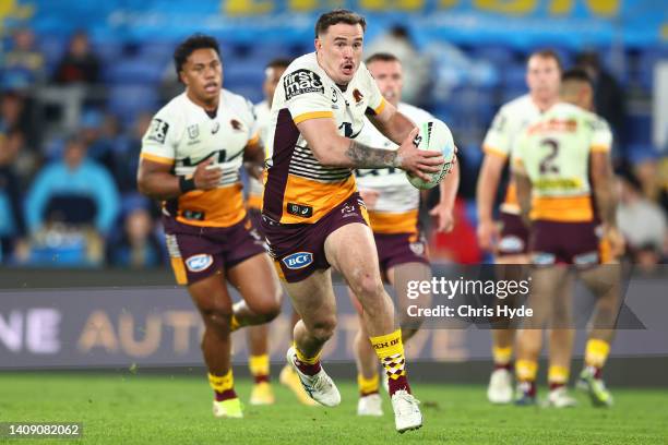 Kobe Hetherington of the Broncos runs the ball during the round 18 NRL match between the Gold Coast Titans and the Brisbane Broncos at Cbus Super...