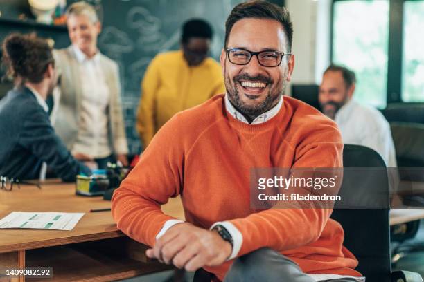 successful businessman in the office - handsome stock pictures, royalty-free photos & images
