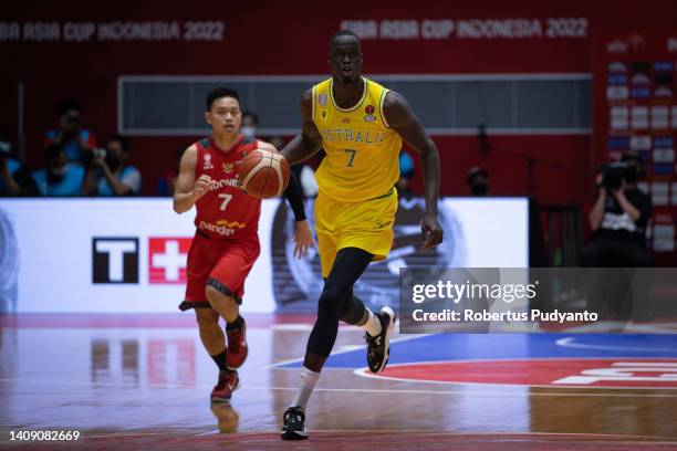 Thon Maker of Australia dribbles the ball during the FIBA Asia Cup Group A game between Australia and Indonesia at Istora Gelora Bung Karno on July...