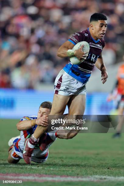 Tolutau Koula of the Sea Eagles is tackled during the round 18 NRL