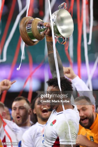 Courtney Lawes of England lifts the trophy during game three of the International Test match series between the Australia Wallabies and England at...