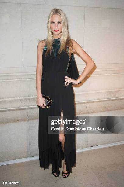 Poppy Delevingne attends 'Louis Vuitton - Marc Jacobs: The Exhibition' Photocall as part of Paris Fashion Week on March 7, 2012 in Paris, France.