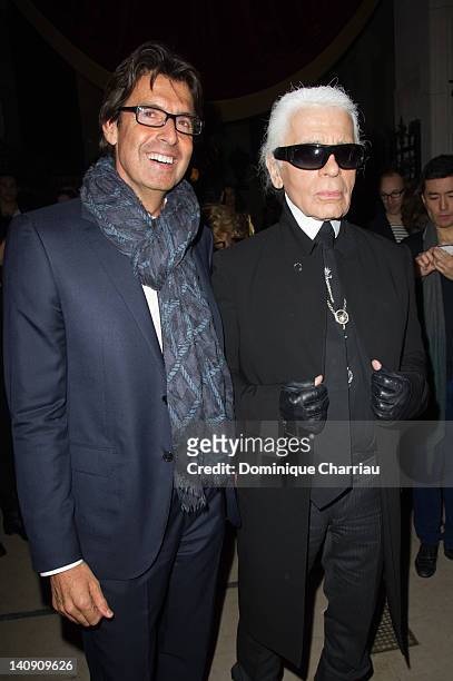Jordi Constans and Karl Lagerfeld attend 'Louis Vuitton - Marc Jacobs: The Exhibition' Photocall as part of Paris Fashion Week on March 7, 2012 in...