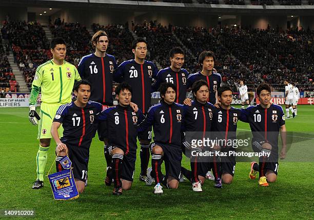 Japanese players line up for team photos prior to the 2014 FIFA World Cup Asian Qualifier match between Japan and Uzbekistan at Toyota Stadium on...