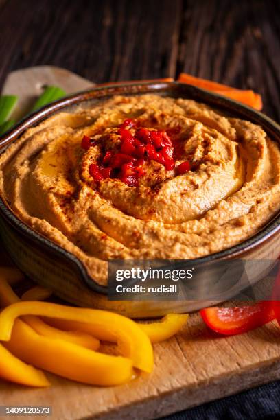 roasted red pepper hummus - roasted pepper stock pictures, royalty-free photos & images