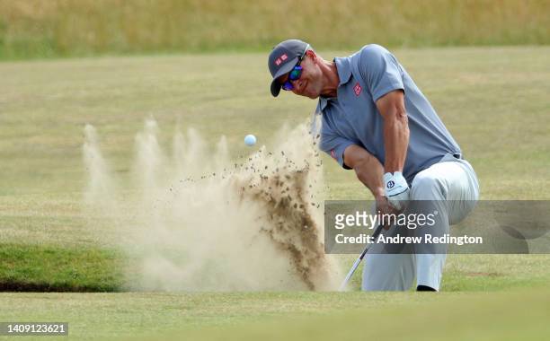 Adam Scott of Australia plays out of a bunker on the 4th hole during Day Three of The 150th Open at St Andrews Old Course on July 16, 2022 in St...