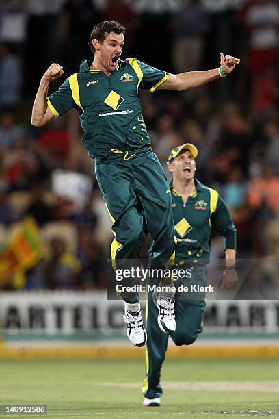 Clint McKay of Australia celebrates after getting the wicket of Chamara Kapugedera of Sri Lanka during the third One Day International Final series...