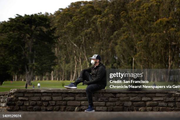 Jordan Frease, who had quadruple bypass surgery 8 months ago, sits on a wall along the Mountain Lake Trail in the Presidio in San Francisco, Calif.,...