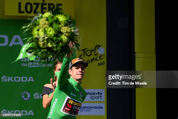 Wout Van Aert of Belgium and Team Jumbo - Visma celebrates winning the Green Points Jersey on the podium ceremony after the 109th Tour de France...