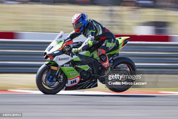 Leon Haslam of Great Britain and TPR Team Pedercini Racing lifts the rear wheel during the World Superbike race 1 during the Fim Superbike World...