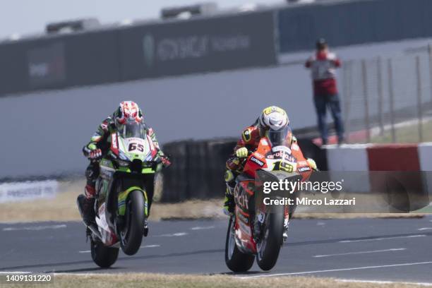 Alvaro Bautista of Spain and Aruba.it Racing - Ducati leads Jonathan Rea of Ireland and Kawasaki Racing Team WorldSBK during the World Superbike race...