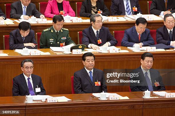 Wu Bangguo, chairman of the Standing Committee of China's National People's Congress, bottom row left, Jia Qinglin, chairman of China's People's...