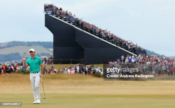 Rory McIlroy of Northern Ireland acknowledges the crowd on the 9th green during Day Three of The 150th Open at St Andrews Old Course on July 16, 2022...