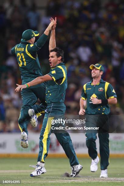 Clint McKay of Australia celebrates taking the wicket of Rangana Herath of Sri Lanka during the third One Day International Final series match...