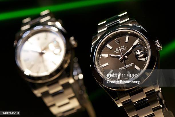 "Oyster Perpetual Datejust" wristwatches, manufactured by Rolex, sit on during the Baselworld watch fair in Basel, Switzerland, on Wednesday, March...