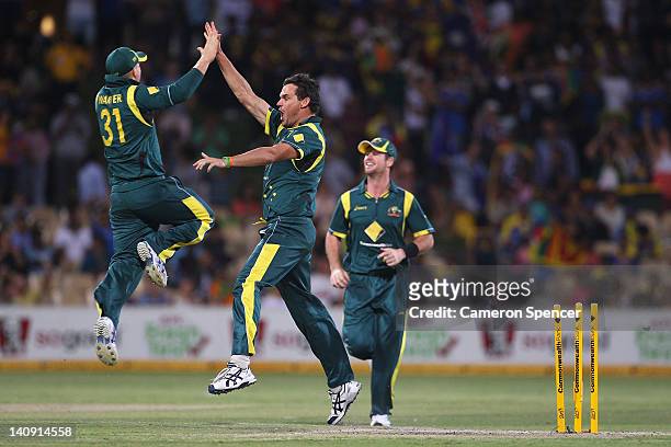 Clint McKay of Australia celebrates taking the wicket of Rangana Herath of Sri Lanka during the third One Day International Final series match...