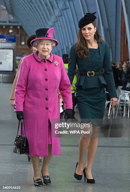 Queen Elizabeth II and Catherine, Duchess of Cambridge arrive at St Pancras station, before boarding a train to visit the city of Leicester, on March...