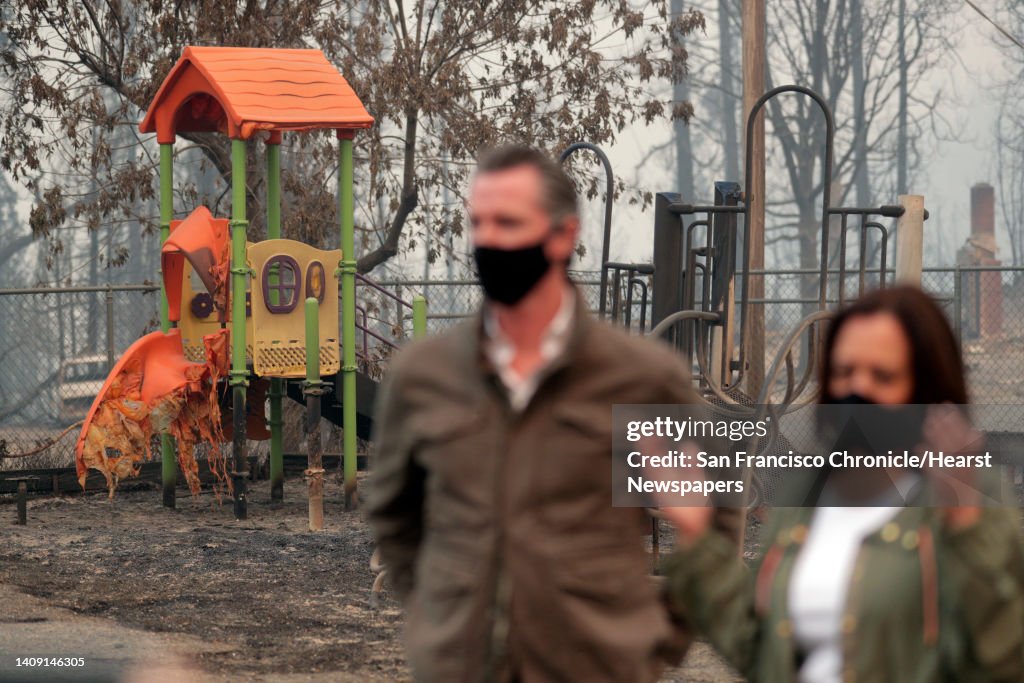A destroyed childrens' playground is visible behind Sen. Kamala Harris, the Democratic vice presidential nominee, as she met with Gov. Gavin Newsom and CalFire officials to review the devastation of the Creek fire in Pineridge, Calif., on Tuesday, Septemb