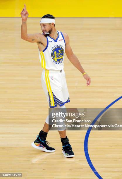 Stephen Curry during the first half as the Golden State Warriors played the Denver Nuggets in their first preseason game at Chase Arena in San...