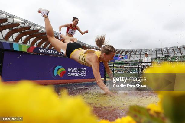 Lea Meyer of Team Germany falls into the water obstacle during the Women’s 3000m Steeplechase heats on day two of the World Athletics Championships...