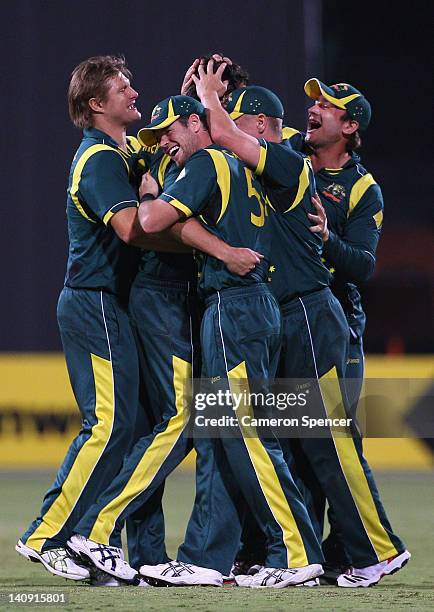 Australian players celebrate winning the third One Day International Final series match between Australia and Sri Lanka at Adelaide Oval on March 8,...