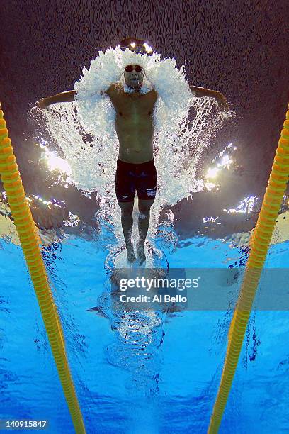 James Goddard of Stockport Metro races in the the Mens 100m Butterfly heats during day six of the British Gas Swimming Championships at the London...