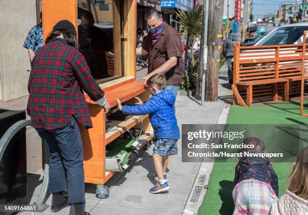 Erro Moazed decides to help out moving the large screen television for the upcoming showing of Toy Story 2 at the Balboa Theater where guests are...