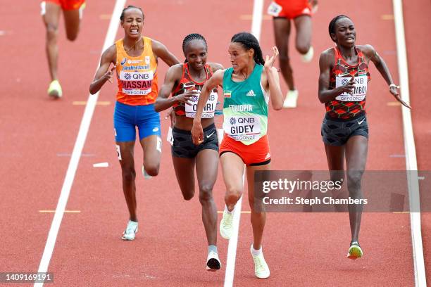 Sifan Hassan of Team Netherlands, Hellen Obiri of Team Kenya, Letesenbet Gidey of Team Ethiopia, and Margaret Chelimo Kipkemboi of Team Kenya compete...